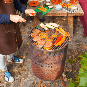 BonFeu BonVes 45 firepit with grill and food